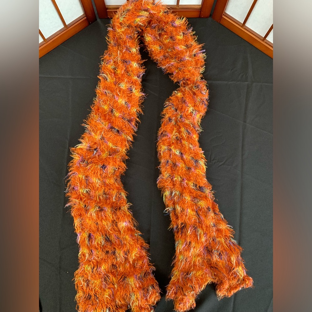 Scarf. Warm soft and cosy Like New. Orange/ other colors Like New